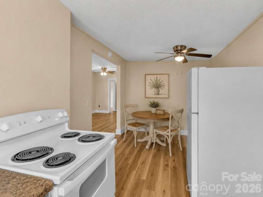 492 Riverbend Street, Waynesville, NC 28786.  MLS# CAR4388344, YatesRealty ID 29640. Kitchen/Breakfast Area Virtually Staged