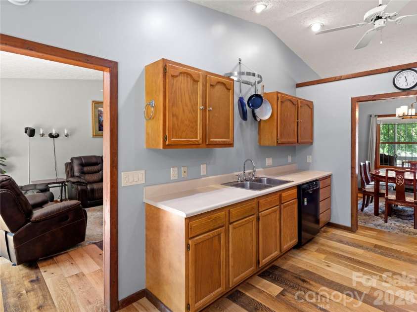 5 Harrison Hill Road, Swannanoa, NC 28778.  MLS# CAR4391617, YatesRealty ID 29644. Living room flows to the spacious kitchen