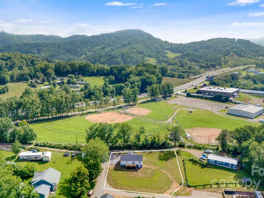 607 Silkwood Drive, Canton, NC 28716.  MLS# CAR4283110, YatesRealty ID 29645. Aerial view with approximate boundaries
