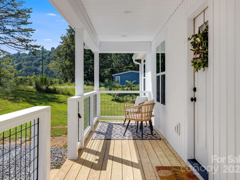 607 Silkwood Drive, Canton, NC 28716.  MLS# CAR4283110, YatesRealty ID 29645. Covered front porch