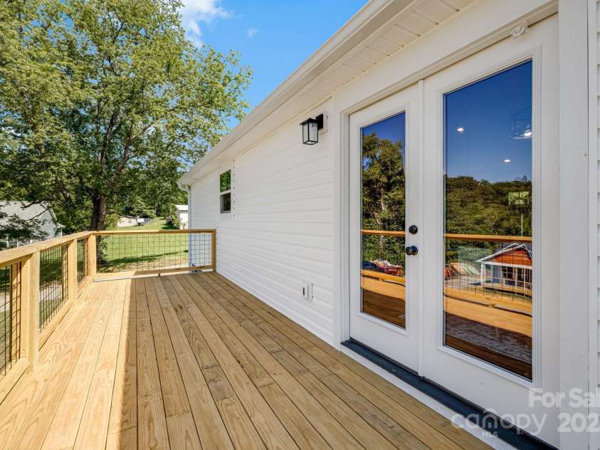607 Silkwood Drive, Canton, NC 28716.  MLS# CAR4283110, YatesRealty ID 29645. Spacious back deck