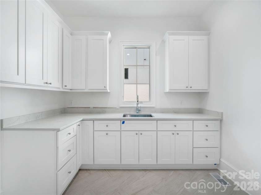 1650 Maryland Avenue, Charlotte, NC 28209.  MLS# CAR4335339, YatesRealty ID 2965. Photograph for representation of build and quality of finishes.