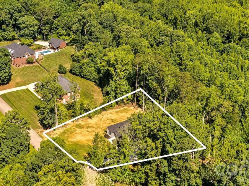 1065 Shawnee Trail, China Grove, NC 28023.  MLS# CAR4391383, YatesRealty ID 29651. Aerial shows how private.