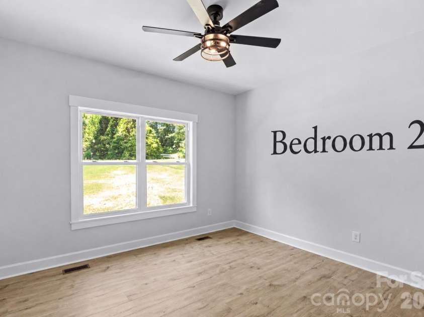 1065 Shawnee Trail, China Grove, NC 28023.  MLS# CAR4391383, YatesRealty ID 29651. Bedroom 2. (All beds great size with nice size closets.)