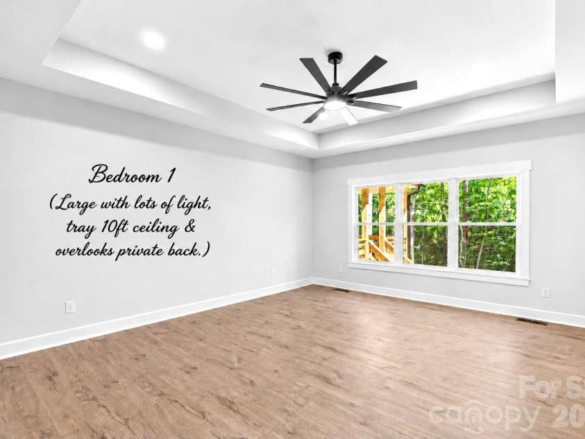 1065 Shawnee Trail, China Grove, NC 28023.  MLS# CAR4391383, YatesRealty ID 29651. Main Bedroom is large with tray ceiling.