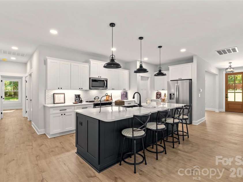 1065 Shawnee Trail, China Grove, NC 28023.  MLS# CAR4391383, YatesRealty ID 29651. Stainless appliances to include the refrigerator come with home.