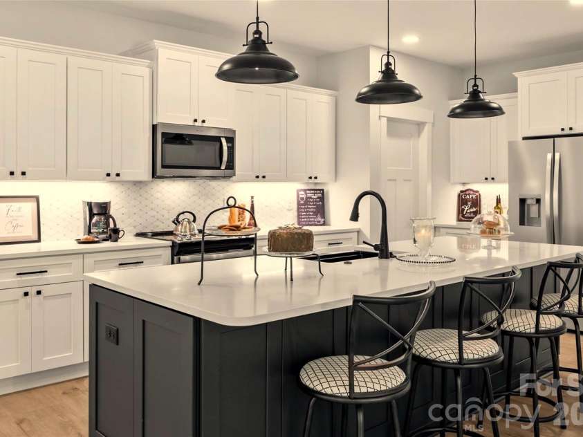 1065 Shawnee Trail, China Grove, NC 28023.  MLS# CAR4391383, YatesRealty ID 29651. Upgraded quartz island & counters throughout.