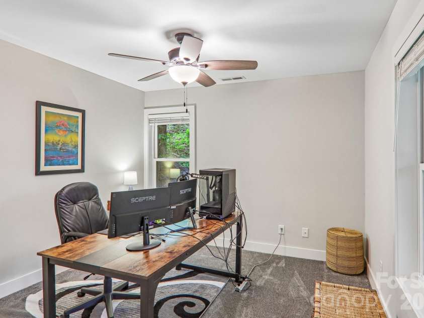 49 Wilderness Trail, Candler, NC 28715.  MLS# CAR4391801, YatesRealty ID 29657. Bedroom 3 lower level. C