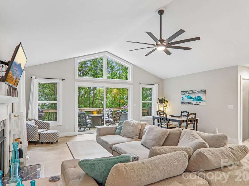 49 Wilderness Trail, Candler, NC 28715.  MLS# CAR4391801, YatesRealty ID 29657. Home on main level is filled with light