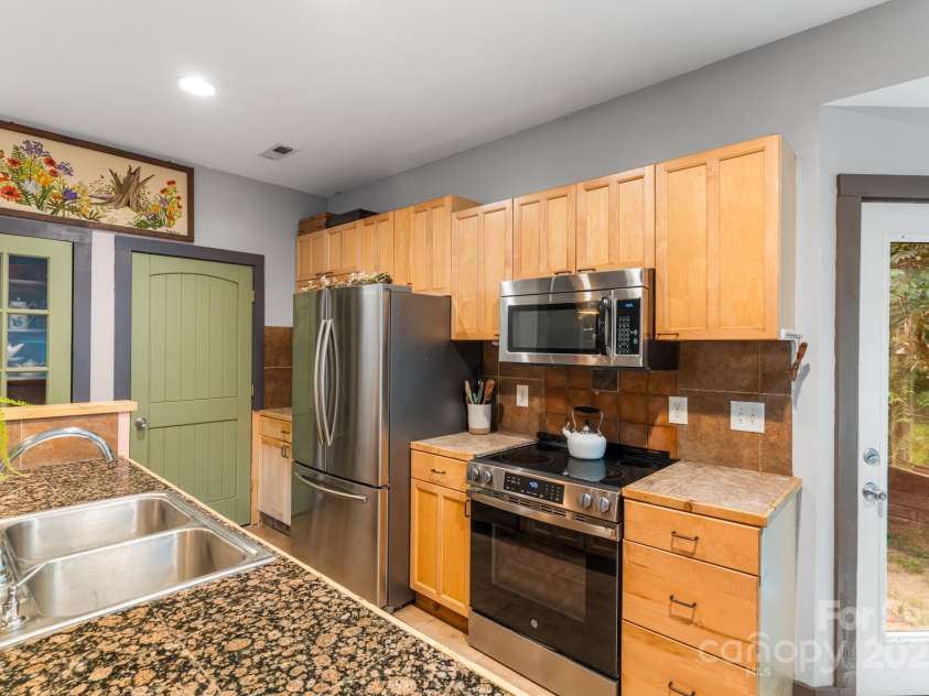 276 Tee Smith Drive, Pisgah Forest, NC 28768.  MLS# CAR4286376, YatesRealty ID 29661. 