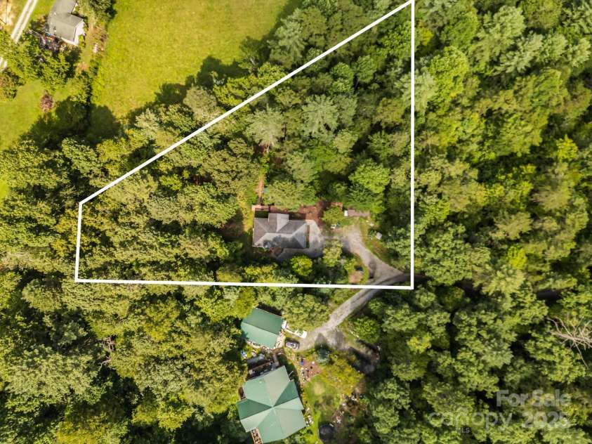 276 Tee Smith Drive, Pisgah Forest, NC 28768.  MLS# CAR4286376, YatesRealty ID 29661. 