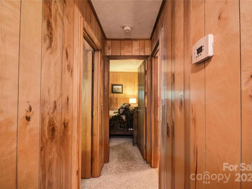 134 Raven Ridge, Maggie Valley, NC 28751.  MLS# CAR4249162, YatesRealty ID 29662. Hallway to the bath and bedrooms