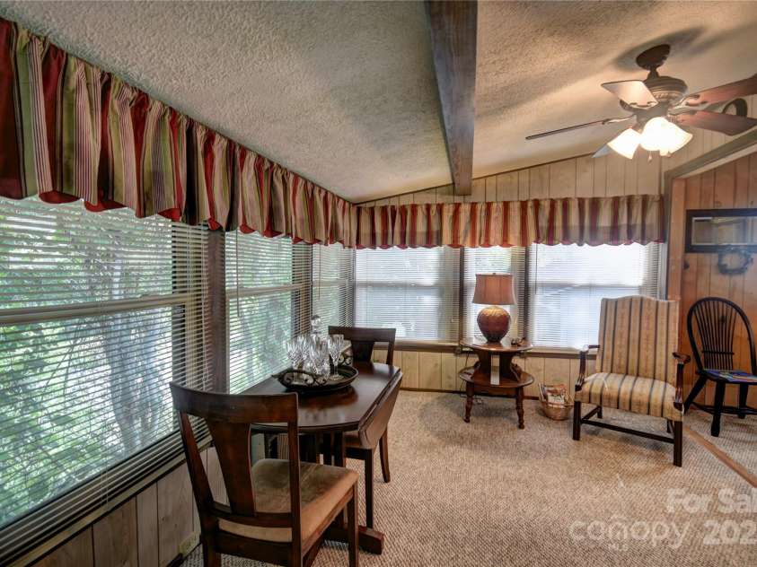 134 Raven Ridge, Maggie Valley, NC 28751.  MLS# CAR4249162, YatesRealty ID 29662. Sunroom at the rear of the home