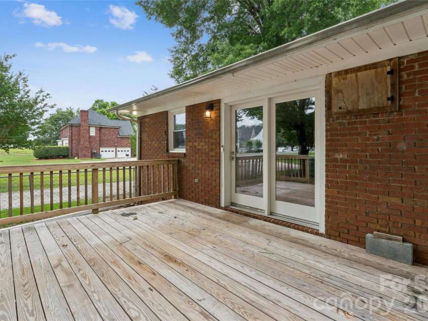 615 5th Street, Landis, NC 28088.  MLS# CAR4386679, YatesRealty ID 29662. Deck off kitchen