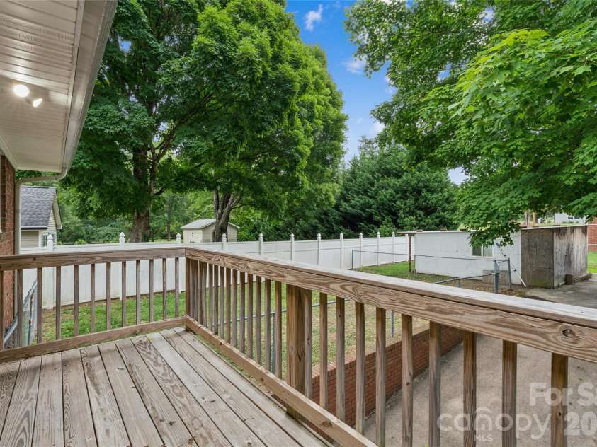 615 5th Street, Landis, NC 28088.  MLS# CAR4386679, YatesRealty ID 29662. Deck off primary bedroom