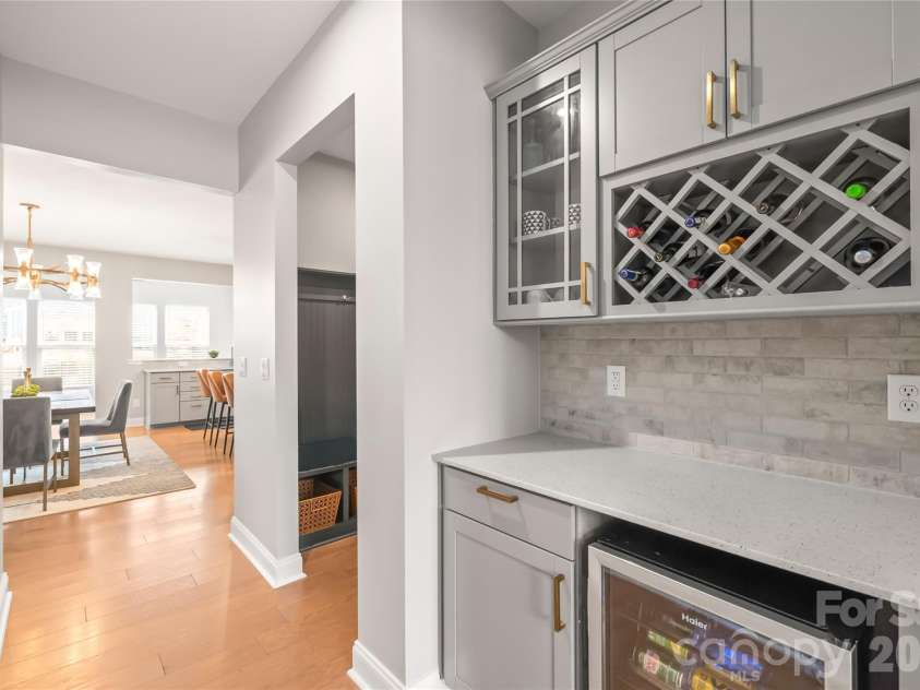 12205 Hollinhope Drive, Charlotte, NC 28278.  MLS# CAR4385321, YatesRealty ID 29673. Butler's Pantry with beverage refrigerator and built-in wine storage