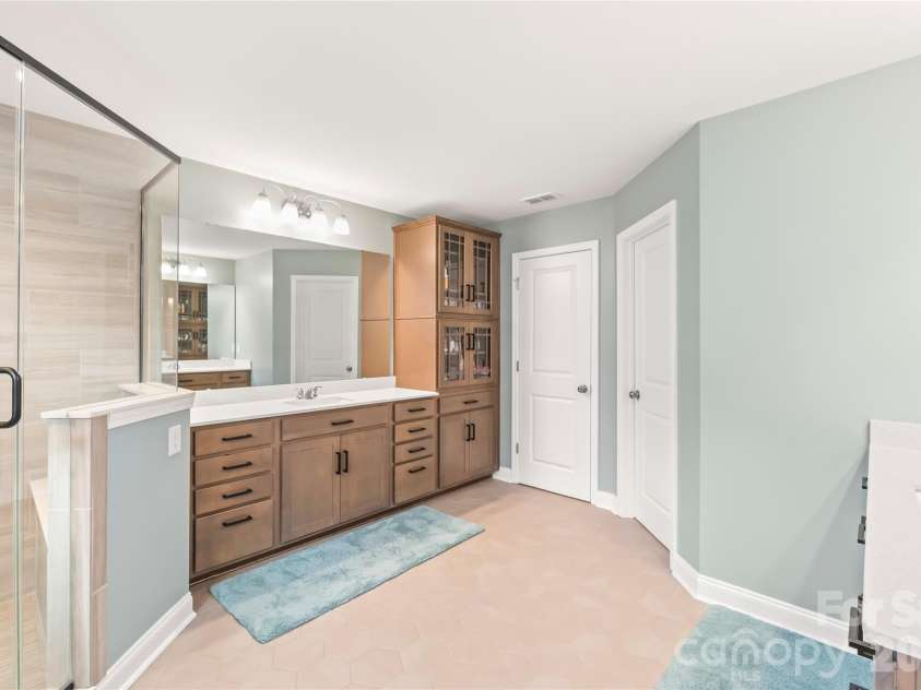 12205 Hollinhope Drive, Charlotte, NC 28278.  MLS# CAR4385321, YatesRealty ID 29673. Primary Bathroom with Walk-in Shower