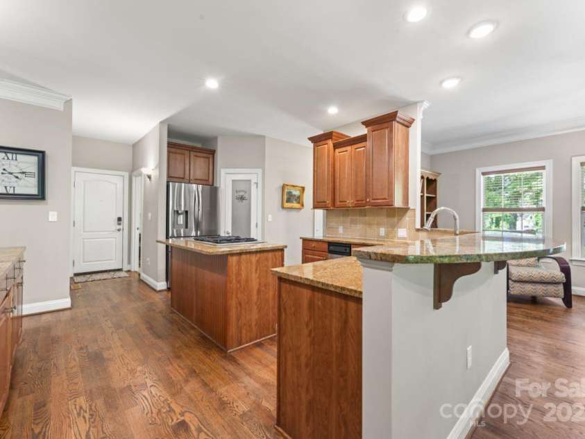3398 Millstone Creek Road, Lancaster, SC 29720.  MLS# CAR4251065, YatesRealty ID 29678. Kitchen with downdraft gas range, stainless appliances and walk in pantry