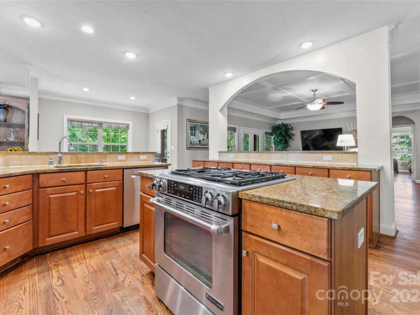 3398 Millstone Creek Road, Lancaster, SC 29720.  MLS# CAR4251065, YatesRealty ID 29678. Kitchen with downdraft gas range, stainless appliances and walk in pantry