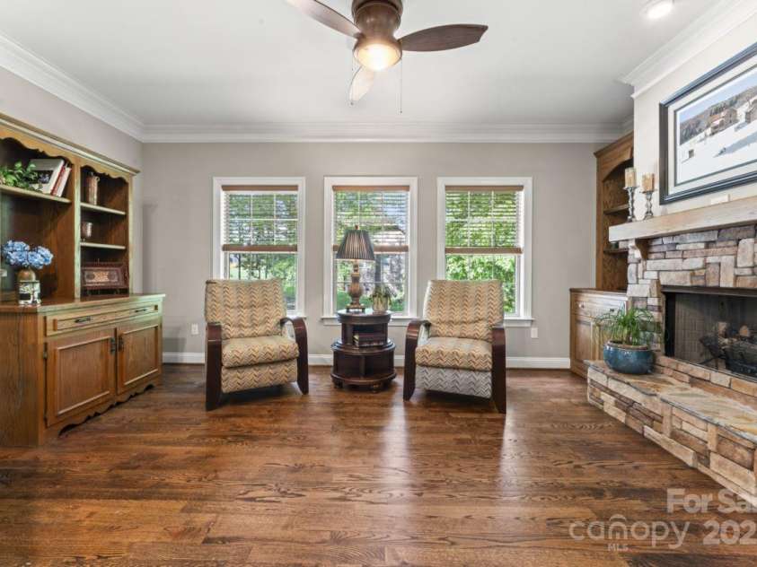 3398 Millstone Creek Road, Lancaster, SC 29720.  MLS# CAR4251065, YatesRealty ID 29678. Sitting room with gas fire place by the kitchen