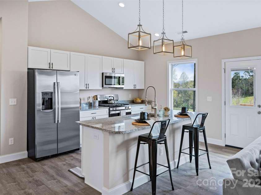 14 Holcombe Road, Candler, NC 28715.  MLS# CAR4274913, YatesRealty ID 2968. 