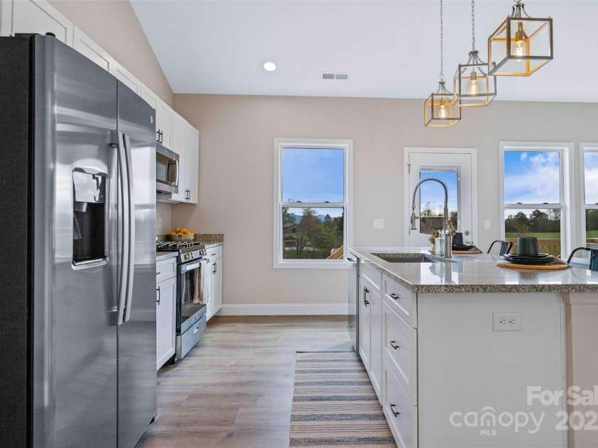 14 Holcombe Road, Candler, NC 28715.  MLS# CAR4274913, YatesRealty ID 2968. 