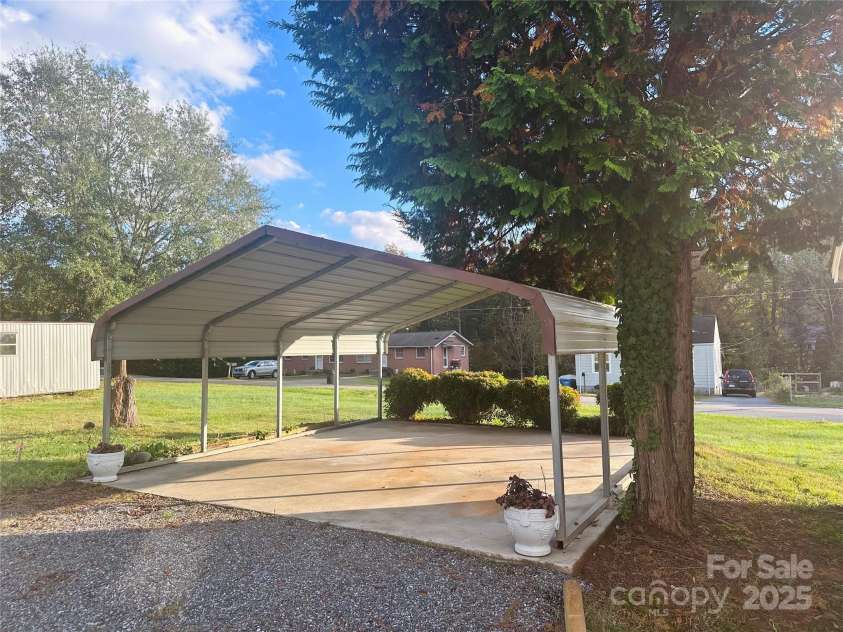 2202 16th Avenue, Hickory, NC 28601.  MLS# CAR4272734, YatesRealty ID 29686. Detached double carport