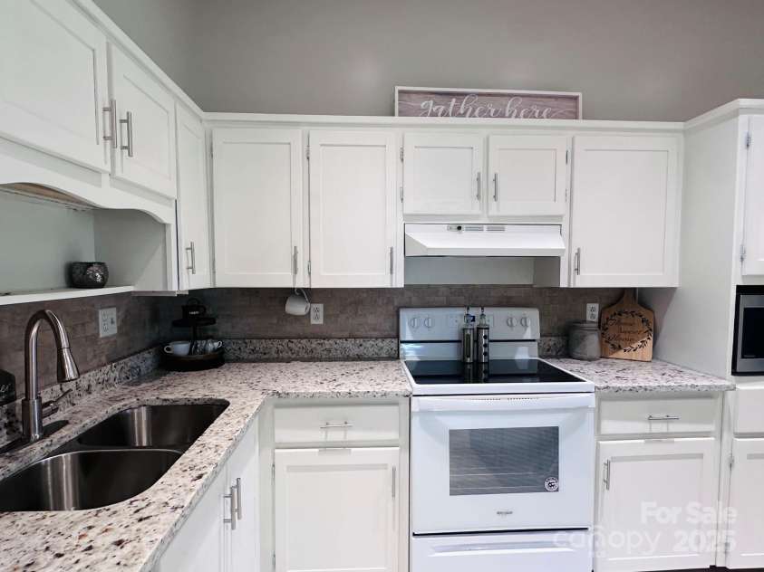 2202 16th Avenue, Hickory, NC 28601.  MLS# CAR4272734, YatesRealty ID 29686. Kitchen with new granite countertops