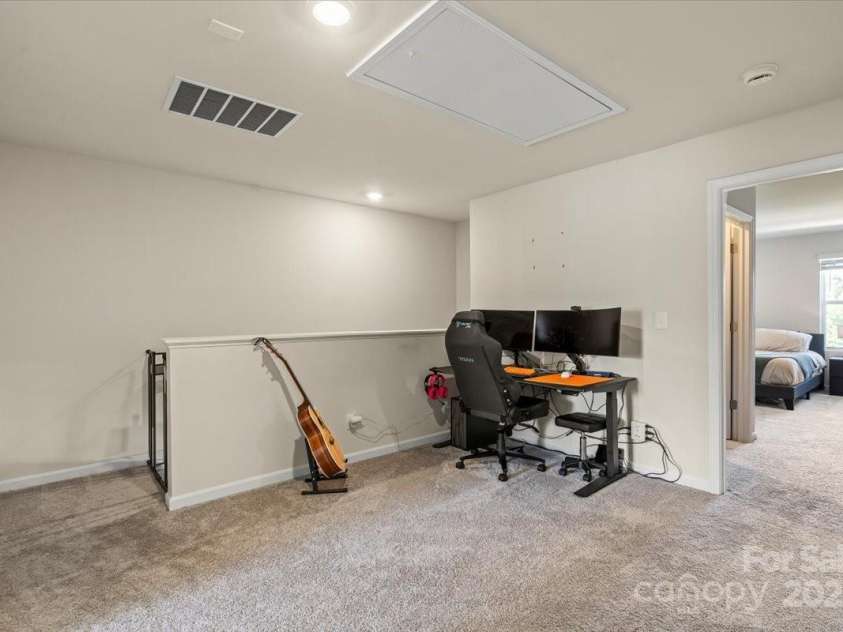 1021 Plumcrest Drive, Charlotte, NC 28216.  MLS# CAR4285638, YatesRealty ID 29689. Attic pull down