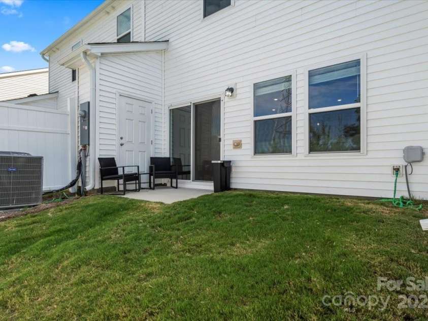 1021 Plumcrest Drive, Charlotte, NC 28216.  MLS# CAR4285638, YatesRealty ID 29689. Backyard partially fenced