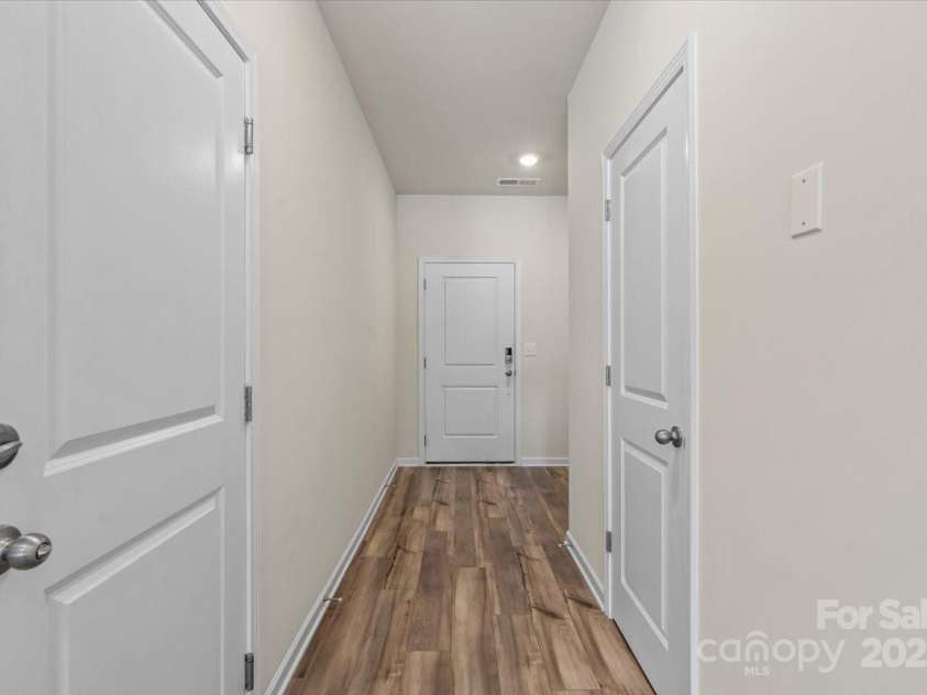 1021 Plumcrest Drive, Charlotte, NC 28216.  MLS# CAR4285638, YatesRealty ID 29689. Entry with half bath