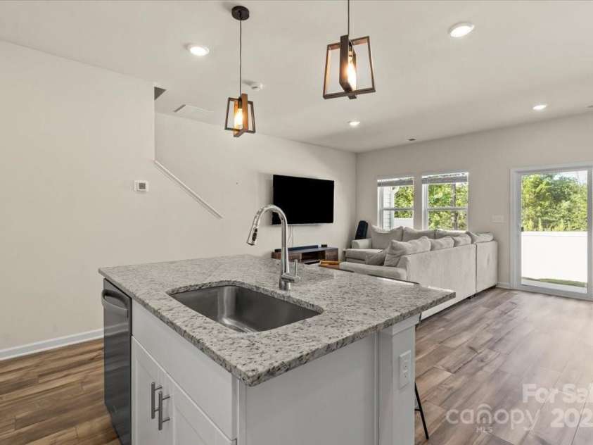 1021 Plumcrest Drive, Charlotte, NC 28216.  MLS# CAR4285638, YatesRealty ID 29689. Moen faucets & Whirlpool SS appliances