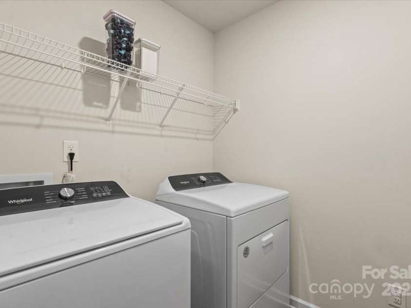 1021 Plumcrest Drive, Charlotte, NC 28216.  MLS# CAR4285638, YatesRealty ID 29689. Spacious laundry room upstairs