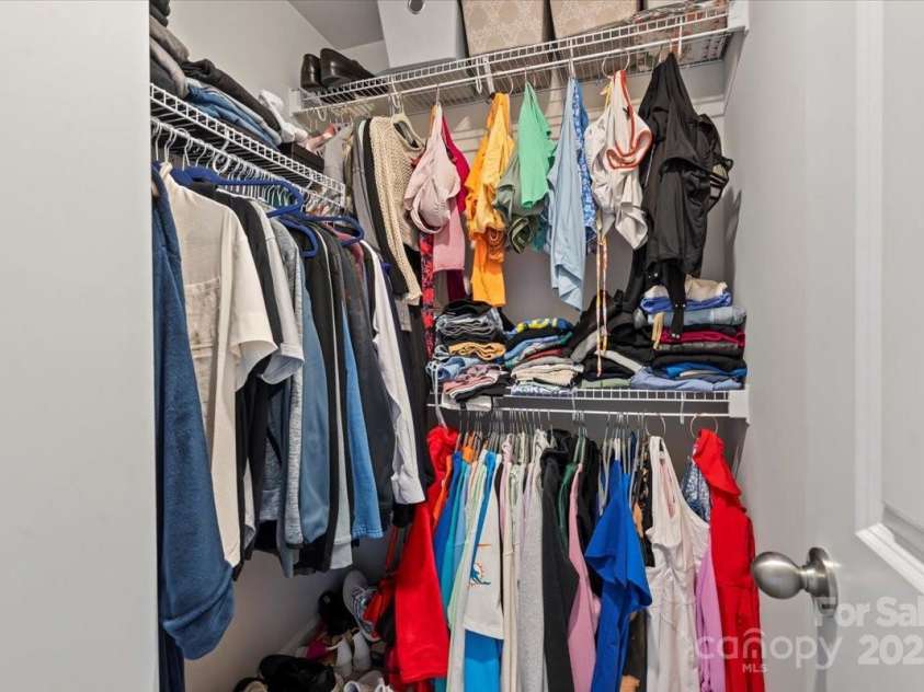 1021 Plumcrest Drive, Charlotte, NC 28216.  MLS# CAR4285638, YatesRealty ID 29689. Spacious primary walk-in closet