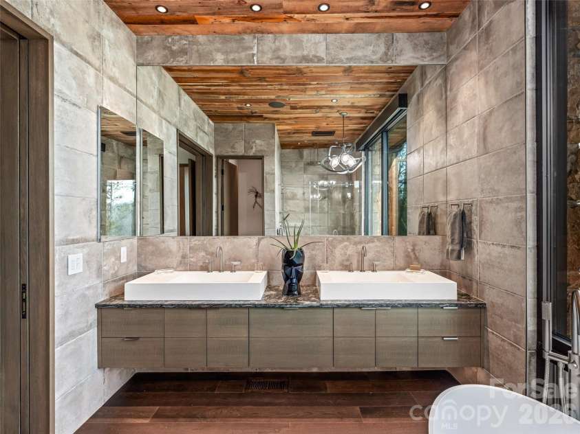 112 Moon Shadow Lane, Marshall, NC 28753.  MLS# CAR4332984, YatesRealty ID 2969. Double vanities with storage and hemlock ceilings complete this beautiful design.