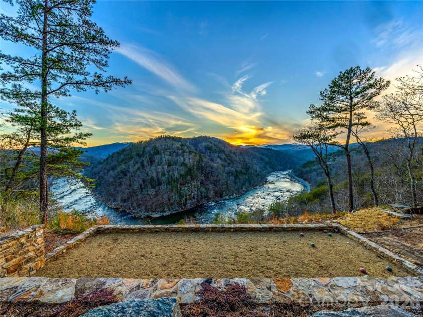 112 Moon Shadow Lane, Marshall, NC 28753.  MLS# CAR4332984, YatesRealty ID 2969. Enjoy nature's masterpiece daily, while playing on your own Bocci Ball Court!