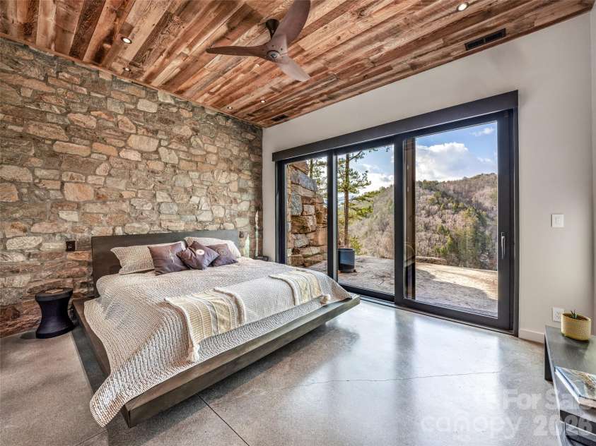 112 Moon Shadow Lane, Marshall, NC 28753.  MLS# CAR4332984, YatesRealty ID 2969. One of the ensuite bedrooms with mountain views!