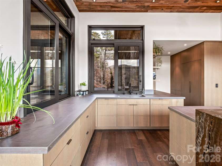 112 Moon Shadow Lane, Marshall, NC 28753.  MLS# CAR4332984, YatesRealty ID 2969. Sub-Zero refrigerator and freezer with auto open-door feature. Two wall ovens, one being steam and the pantry.