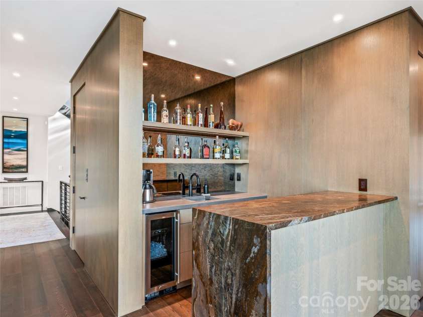 112 Moon Shadow Lane, Marshall, NC 28753.  MLS# CAR4332984, YatesRealty ID 2969. Wet bar with sink, wine cooler, and beverage drawers and plenty of storage.