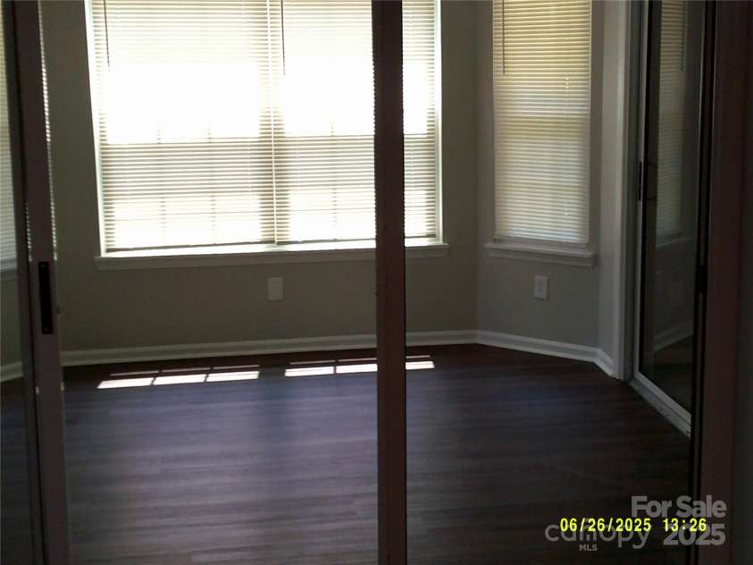 5855 Amity Springs Drive, Charlotte, NC 28212.  MLS# CAR4275097, YatesRealty ID 29690. Multi use glassed in room