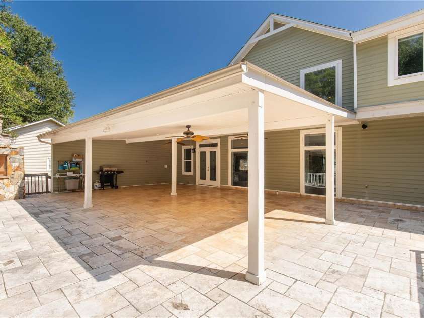 5555 Riverfront Road, Lake Wylie, SC 29710.  MLS# CAR4425921, YatesRealty ID 29692. Covered back porch