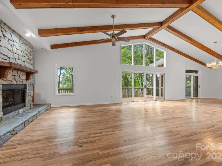 110 Thrashing Rock Drive, Hendersonville, NC 28739.  MLS# CAR4282429, YatesRealty ID 29693. Beautiful vaulted living room with beams