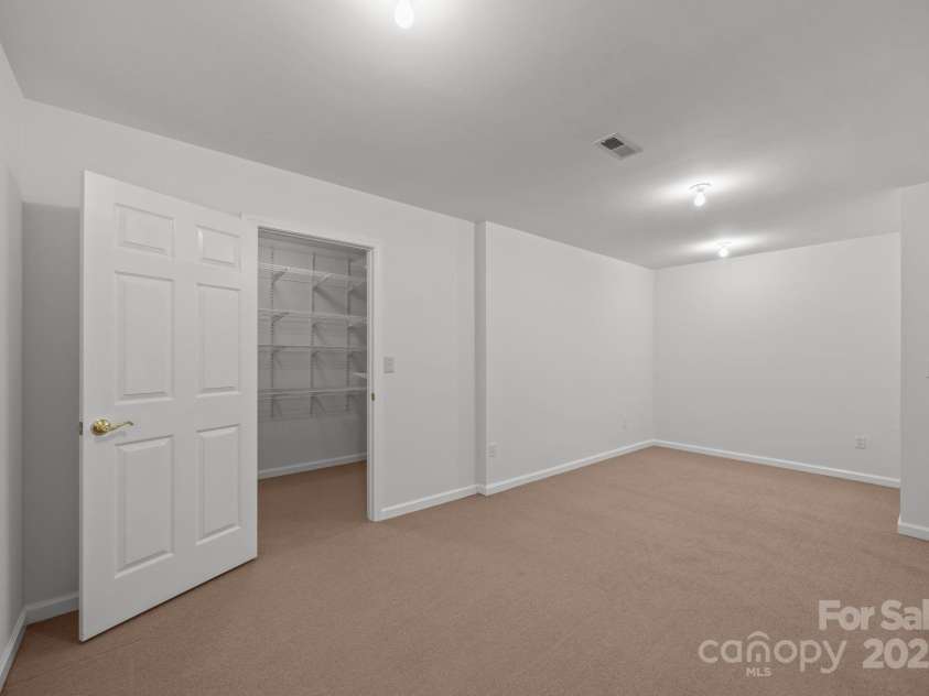 110 Thrashing Rock Drive, Hendersonville, NC 28739.  MLS# CAR4282429, YatesRealty ID 29693. Downstairs bonus room