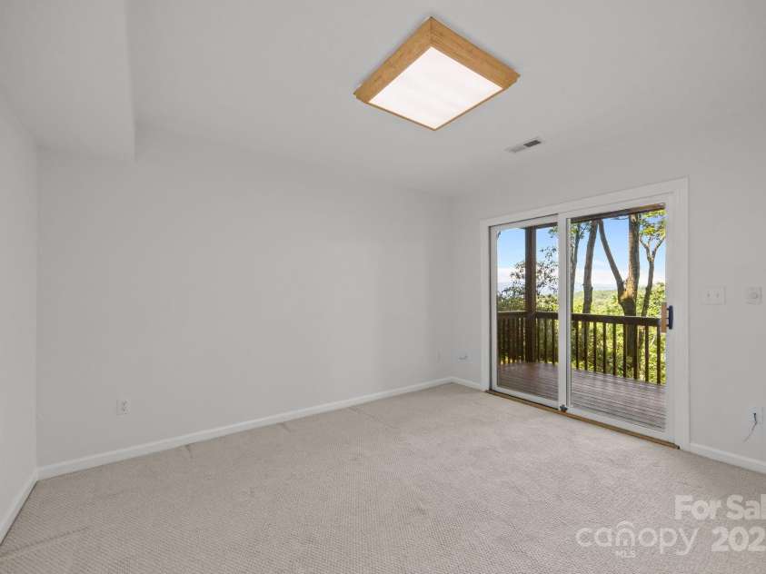 110 Thrashing Rock Drive, Hendersonville, NC 28739.  MLS# CAR4282429, YatesRealty ID 29693. Downstairs office