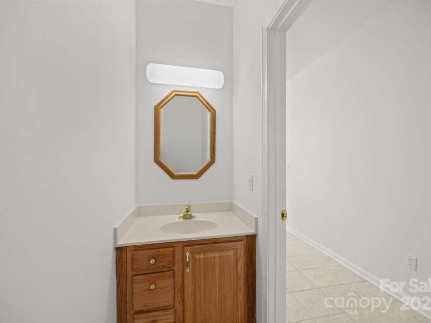 110 Thrashing Rock Drive, Hendersonville, NC 28739.  MLS# CAR4282429, YatesRealty ID 29693. Half bath on mudroom entrance way