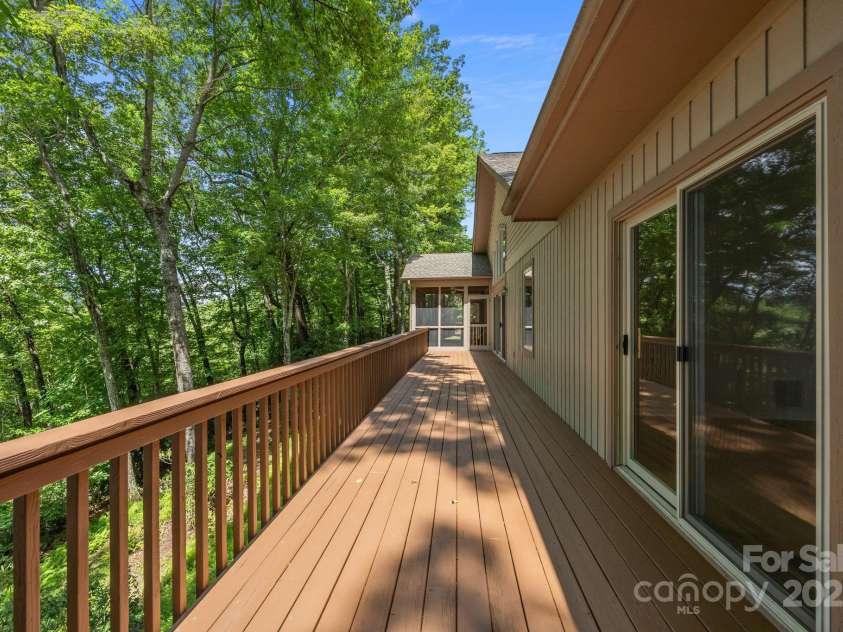 110 Thrashing Rock Drive, Hendersonville, NC 28739.  MLS# CAR4282429, YatesRealty ID 29693. Large deck for entertaining or relaxing