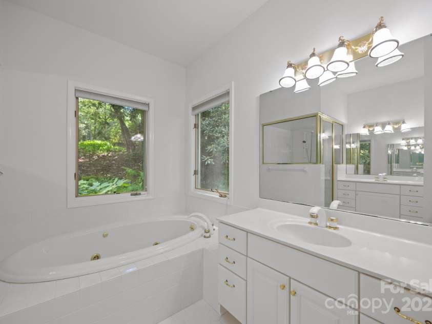 110 Thrashing Rock Drive, Hendersonville, NC 28739.  MLS# CAR4282429, YatesRealty ID 29693. Primary bathroom