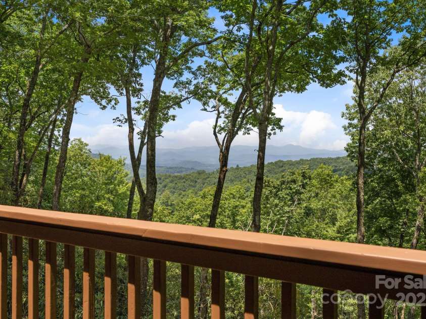 110 Thrashing Rock Drive, Hendersonville, NC 28739.  MLS# CAR4282429, YatesRealty ID 29693. The perfect place for your morning coffee