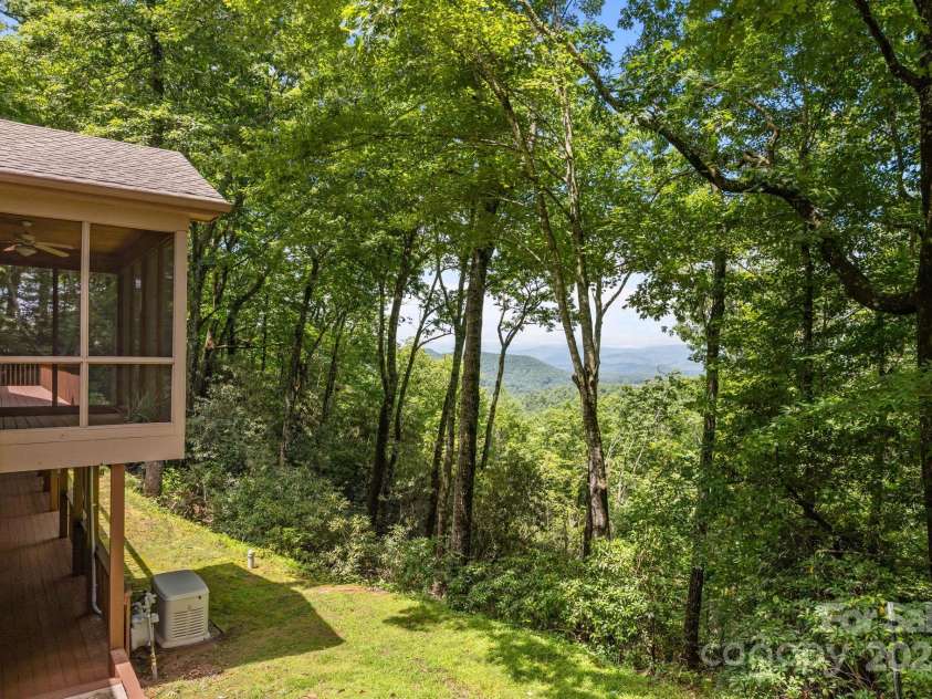 110 Thrashing Rock Drive, Hendersonville, NC 28739.  MLS# CAR4282429, YatesRealty ID 29693. View from the driveway