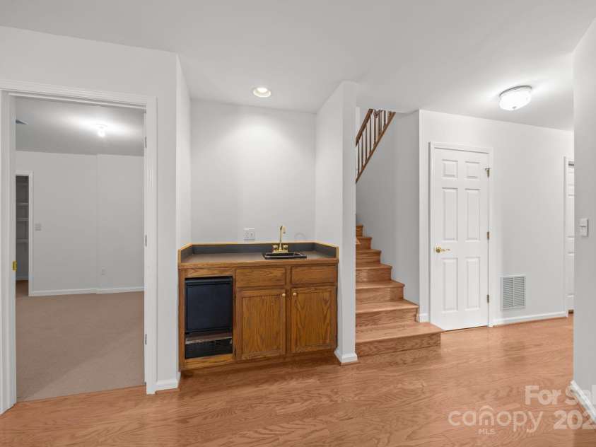 110 Thrashing Rock Drive, Hendersonville, NC 28739.  MLS# CAR4282429, YatesRealty ID 29693. Wet bar in downstairs family room